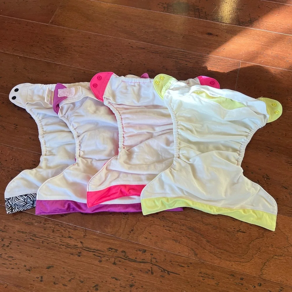 4 Bum Genius diapers shells and liners